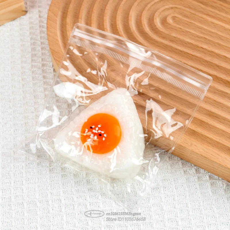 Egg Yolk Squishy Toy - Food-Safe Silicone Stress Ball, Kawaii Rice Ball Popping Fidget Sensory Toy for Anxiety & Focus